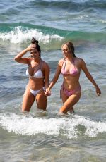 MEGAN BARTON HANSON and DEMI SIMS in Bikinis at Celebs Go Dating Show Set in Crete 07/31/2019