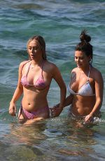 MEGAN BARTON HANSON and DEMI SIMS in Bikinis at Celebs Go Dating Show Set in Crete 07/31/2019