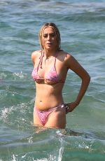 MEGAN BARTON HANSON and DEMI SIMS in Bikinis at Celebs Go Dating Show Set in Crete 07/31/2019