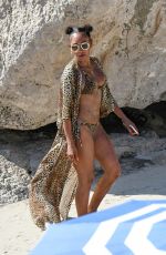 MELANIE BROWN in Bikini at a Beach in Capri 08/04/2019