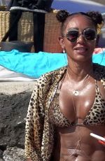 MELANIE BROWN in Bikini at a Beach in Capri 08/04/2019