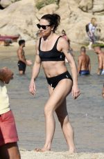 MELANIE CHISHOLM in Bikini at a Beach in Mykonos 08/24/2019