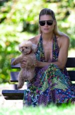 MICHELLE HUNZIKER and Tomaso Trussardi with Their Dog at a Park in Bergamo 08/03/2019