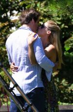 MICHELLE HUNZIKER and Tomaso Trussardi with Their Dog at a Park in Bergamo 08/03/2019
