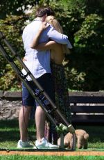 MICHELLE HUNZIKER and Tomaso Trussardi with Their Dog at a Park in Bergamo 08/03/2019