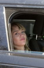 MILEY and TISH CYRUS Out Driving in Los Angeles 08/17/2019