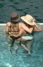 MILEY CYRUS and KAITLYNN CARTER in Bikinis on Vacation in Lake Como 08/09/2019