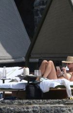 MILEY CYRUS and KAITLYNN CARTER in Bikinis on Vacation in Lake Como 08/09/2019