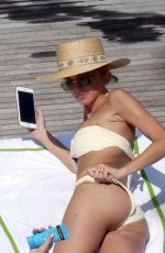 MILEY CYRUS and KAITLYNN CARTER in Bikinis on Vacation in Lake Como 08/09/2019