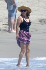 REESE WITHERSPOON in Swimsuit at a Beach in Malibu 08/25/2019