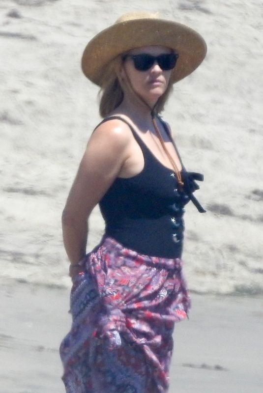 REESE WITHERSPOON in Swimsuit at a Beach in Malibu 08/25/2019