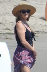 REESE WITHERSPOON in Swimsuit at a Beach in Malibu 08/25/2019