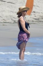 REESE WITHERSPOON in Swimsuit at a Beach in Malibu 08/25/2019