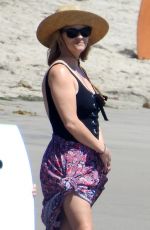 REESE WITHERSPOON in Swimsuit at a Beach in Malibu 08/25/2019
