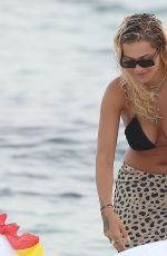 RITA ORA in Bikini Top at a Boat in Ibiza 08/05/2019