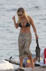 RITA ORA in Bikini Top at a Boat in Ibiza 08/05/2019