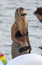 RITA ORA in Bikini Top at a Boat in Ibiza 08/05/2019
