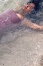 SALMA HAYEK in Swimsuit Rrelaxing at a Beach 08/20/2019 Instagram Pictures