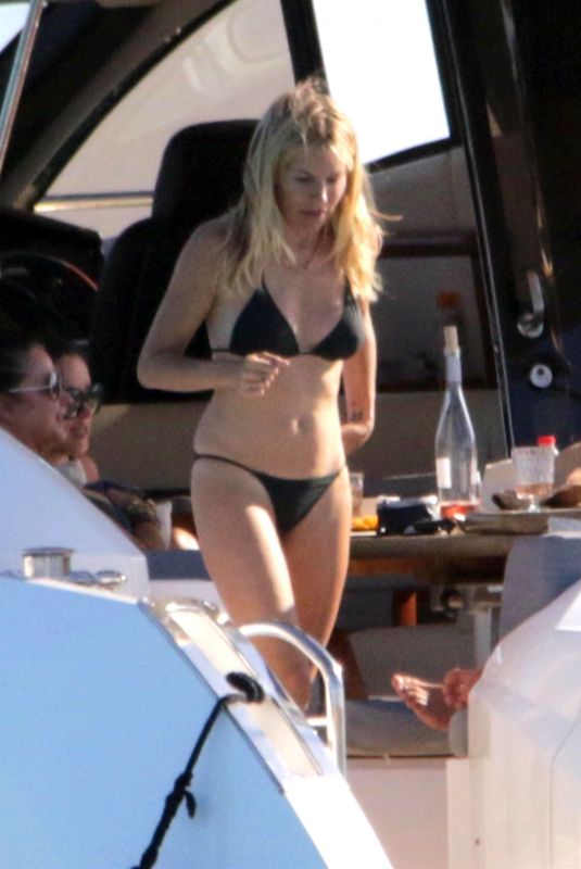 SIENNA MILLER in Bikini at a Yacht in Formentera 08/14/2019