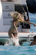 SIENNA MILLER in Bikini at a Yacht in Formentera 08/14/2019