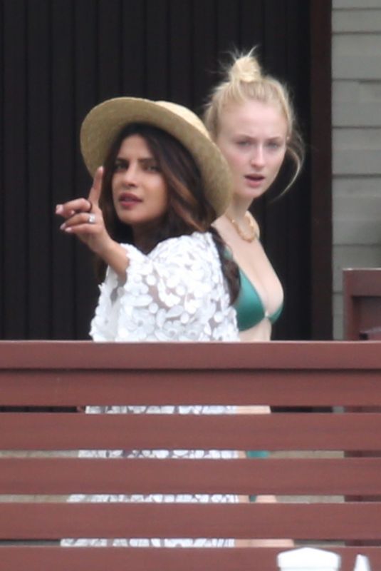 SOPHIE TURNER and PRIYANKA CHOPRA in Swimwear at a Pool in Miami 08/03/2019
