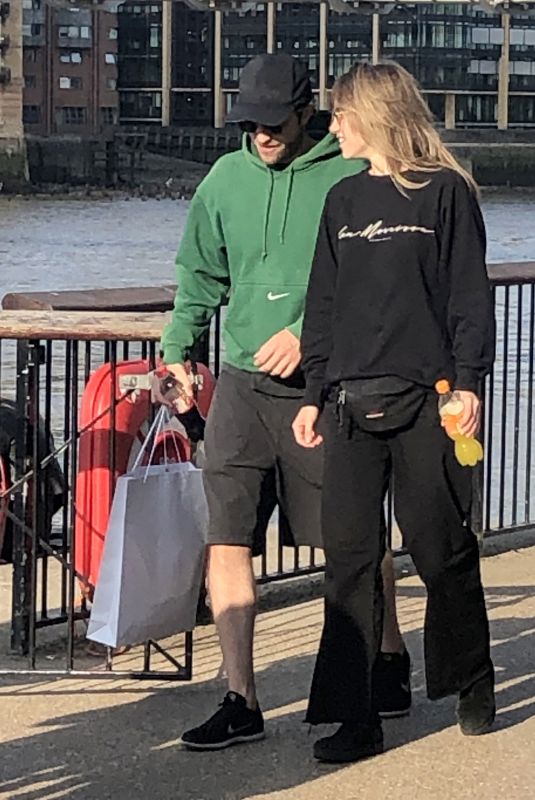 SUKI WATERHOUSE and Robert Pattinson Out in London 08/14/2019