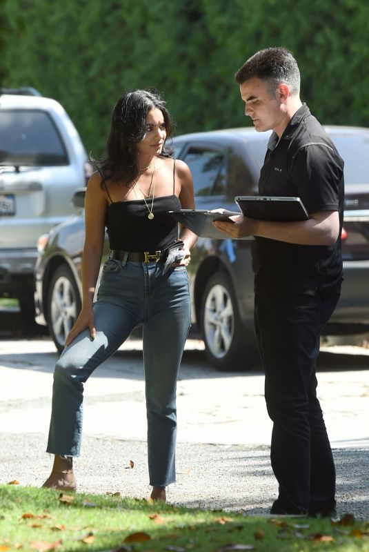VANESSA HUDGENS Signs Off on a New Tesla Delivered to Her in Los Angeles 07/30/2019