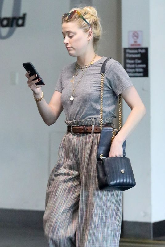 AMBER HEARD Leaves Meeting with Lawyers on Wilshire Blvd in Los Angeles 09/04/2019