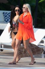 AMBER TURNER and CHLOE B in Bikinis at a Pool in Marbella09/16/2019