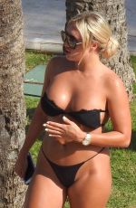AMBER TURNER in Bikini Out in Marbella 09/18/2019