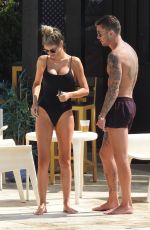 CHLOE SIMS in Bikini at a Pool in Marbella 09/18/2019
