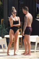 CHLOE SIMS in Bikini at a Pool in Marbella 09/18/2019