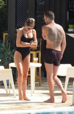 CHLOE SIMS in Bikini at a Pool in Marbella 09/18/2019