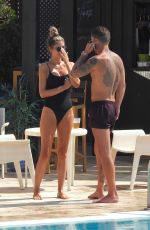 CHLOE SIMS in Bikini at a Pool in Marbella 09/18/2019