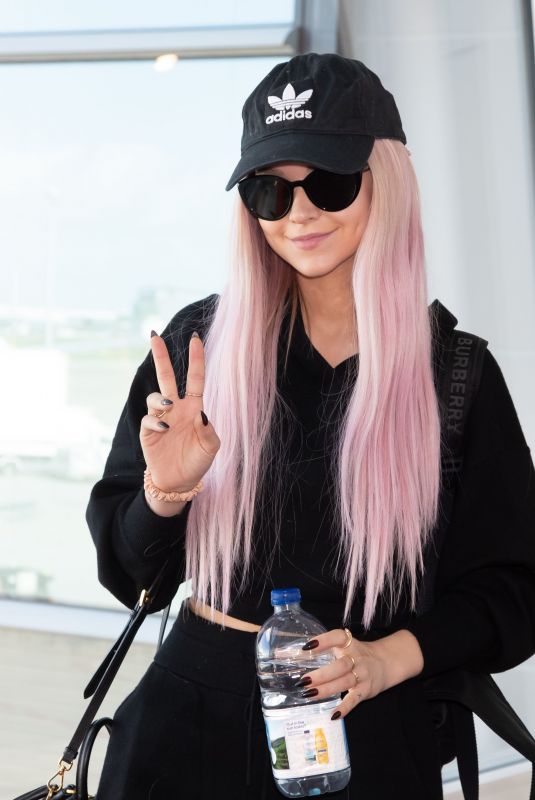 DOVE CAMERON at Tokyo International Airport 09/08/2019