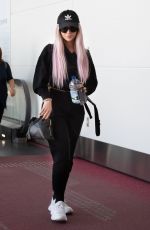 DOVE CAMERON at Tokyo International Airport 09/08/2019
