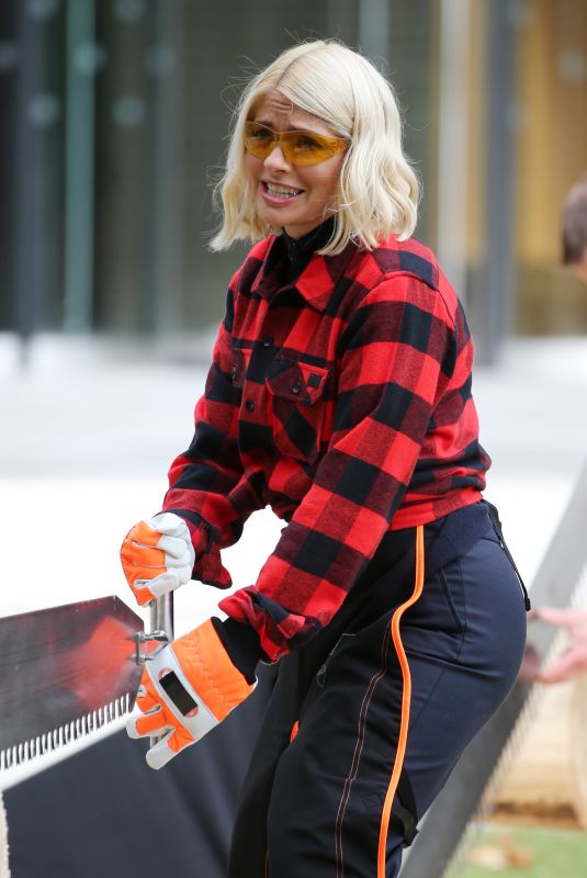 HOLLY WILLOGHBY at Stihl Games Challenge Cutting Timber at This Morning Show 09/11/2019