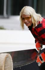 HOLLY WILLOGHBY at Stihl Games Challenge Cutting Timber at This Morning Show 09/11/2019