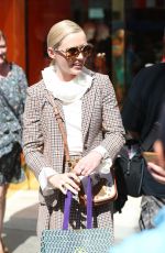 KATHRYN NEWTON Leaves Tory Burch