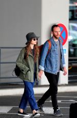 LILY COLLINS and Charlie McDowell Arrives in New York 09/08/2019