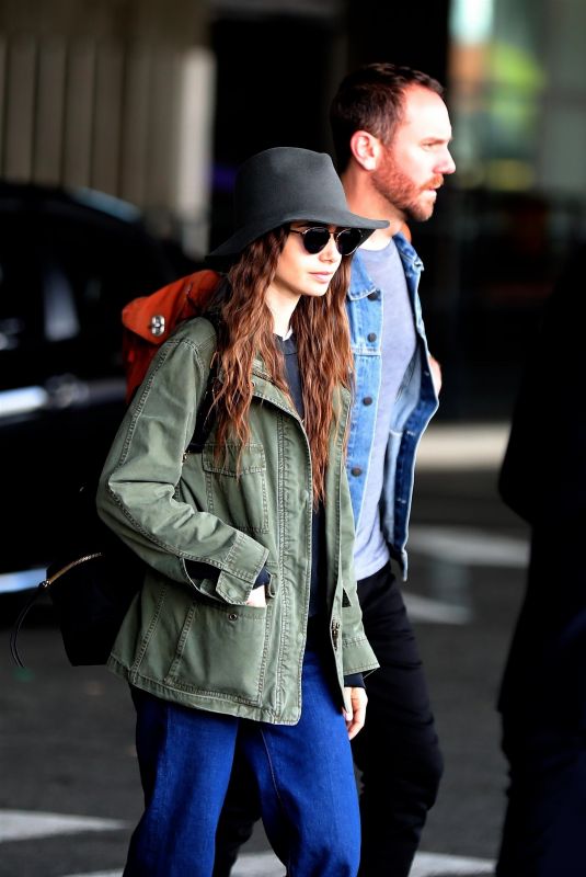 LILY COLLINS and Charlie McDowell Arrives in New York 09/08/2019
