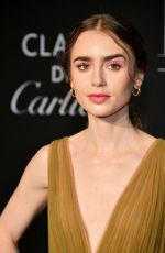 LILY COLLINS at Harper