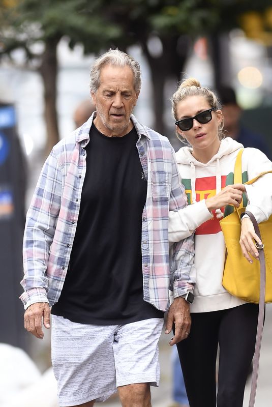 SIENNA MILLER and Her Father Edwin Miller Out with Their Dog in New York 09/06/2019