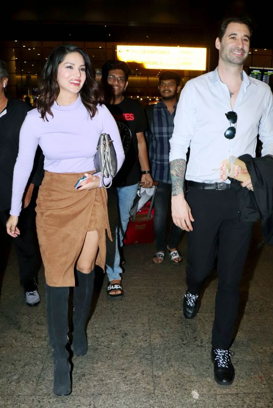 SUNNY LEONE Arrives at Airport in Mumbai 09/07/2019