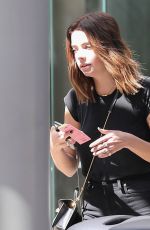 ASHLEY BENSON Leaves an Office Building in Century City 10/03/2019