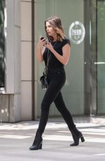 ASHLEY BENSON Leaves an Office Building in Century City 10/03/2019