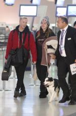 BELLA THORNE and Alex Martini at LAX Airport in Los Angeles 10/06/2019