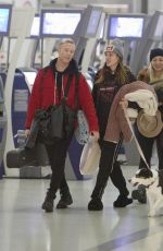 BELLA THORNE and Alex Martini at LAX Airport in Los Angeles 10/06/2019