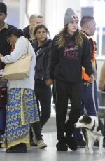 BELLA THORNE and Alex Martini at LAX Airport in Los Angeles 10/06/2019
