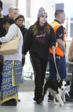 BELLA THORNE and Alex Martini at LAX Airport in Los Angeles 10/06/2019